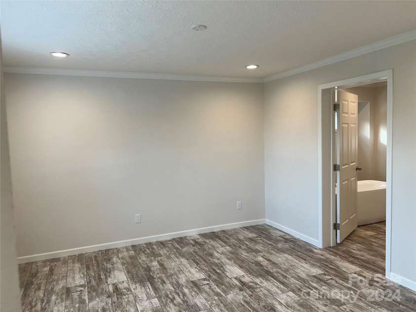 51 Rosemont Drive, Stony Point, NC 28678.  MLS# CAR4201789, YatesRealty ID 3541. Primary Bedroom