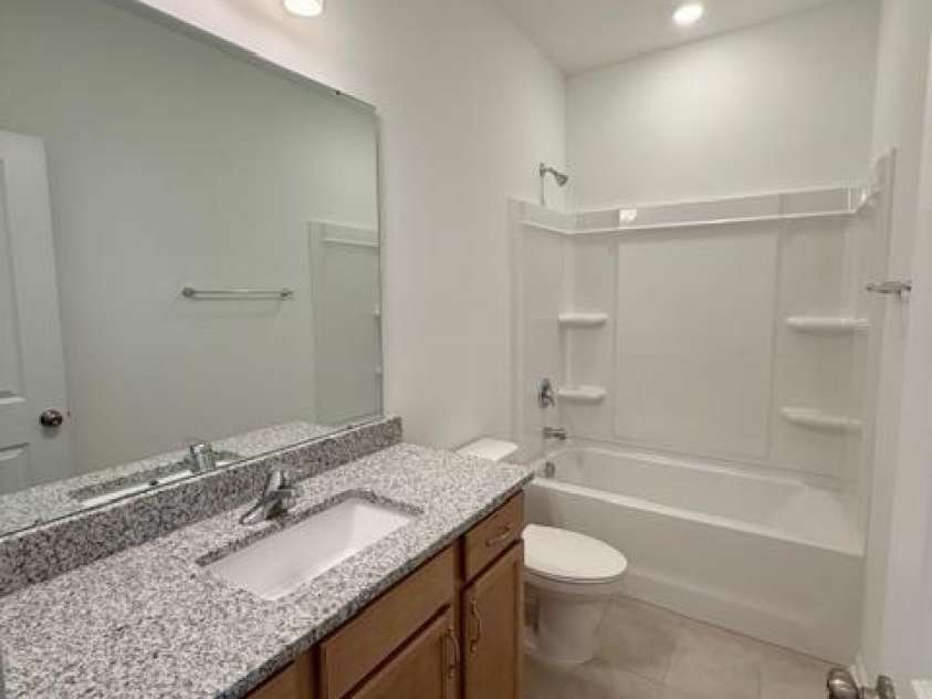 549 Annie Lowery Way, Davidson, NC 28036.  MLS# CAR4353734, YatesRealty ID 3542. Guest Bathroom- 3rd level