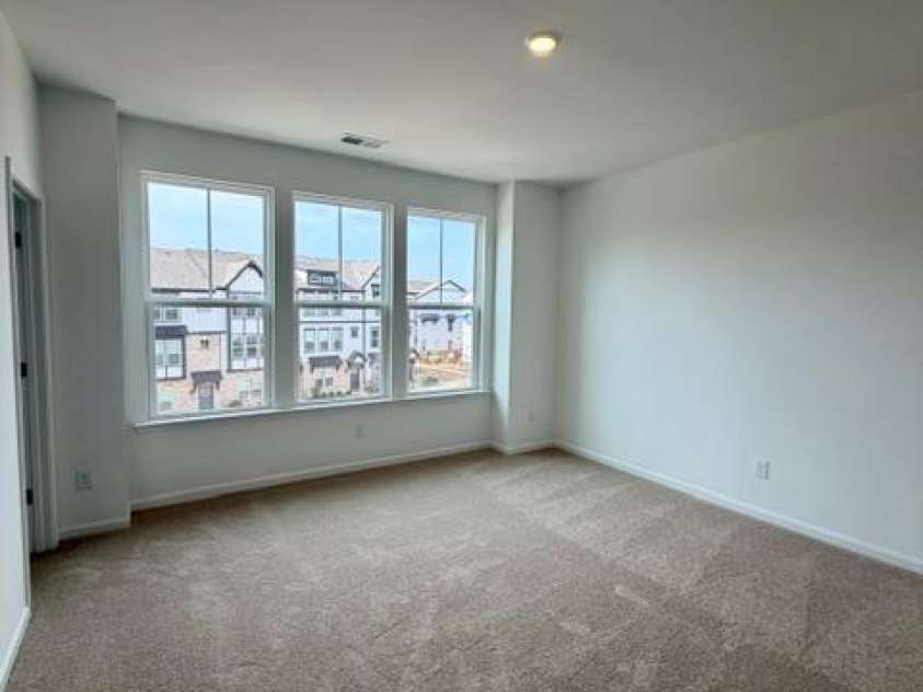 549 Annie Lowery Way, Davidson, NC 28036.  MLS# CAR4353734, YatesRealty ID 3542. Primary bedroom- 3rd level
