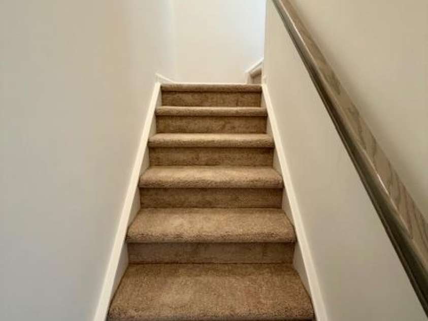 549 Annie Lowery Way, Davidson, NC 28036.  MLS# CAR4353734, YatesRealty ID 3542. Stairs to 3rd floor