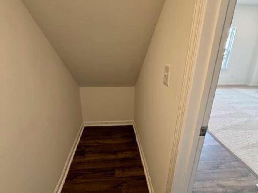 549 Annie Lowery Way, Davidson, NC 28036.  MLS# CAR4353734, YatesRealty ID 3542. Under stairs - main