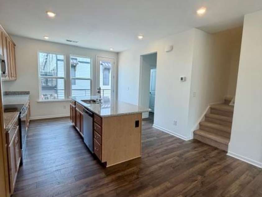 549 Annie Lowery Way, Davidson, NC 28036.  MLS# CAR4353734, YatesRealty ID 3542. View to kitchen- 2nd level