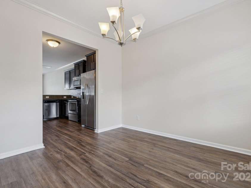 2822 Hopeton Court, Monroe, NC 28110.  MLS# CAR4285934, YatesRealty ID 35422. Dining room off the kitchen