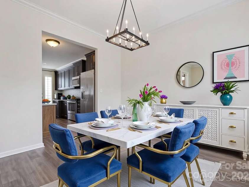 2822 Hopeton Court, Monroe, NC 28110.  MLS# CAR4285934, YatesRealty ID 35422. Dining room open to kitchen- virtually staged