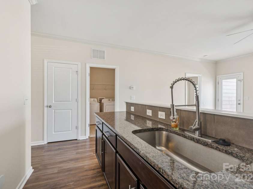 2822 Hopeton Court, Monroe, NC 28110.  MLS# CAR4285934, YatesRealty ID 35422. Kitchen with breakfast bar