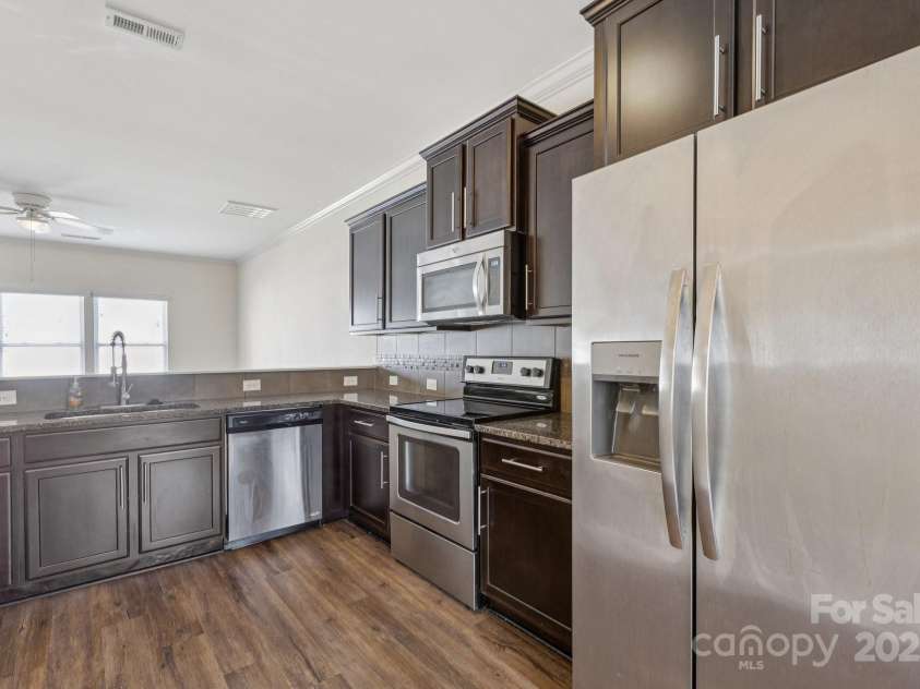 2822 Hopeton Court, Monroe, NC 28110.  MLS# CAR4285934, YatesRealty ID 35422. Kitchen with stainless steel appliances