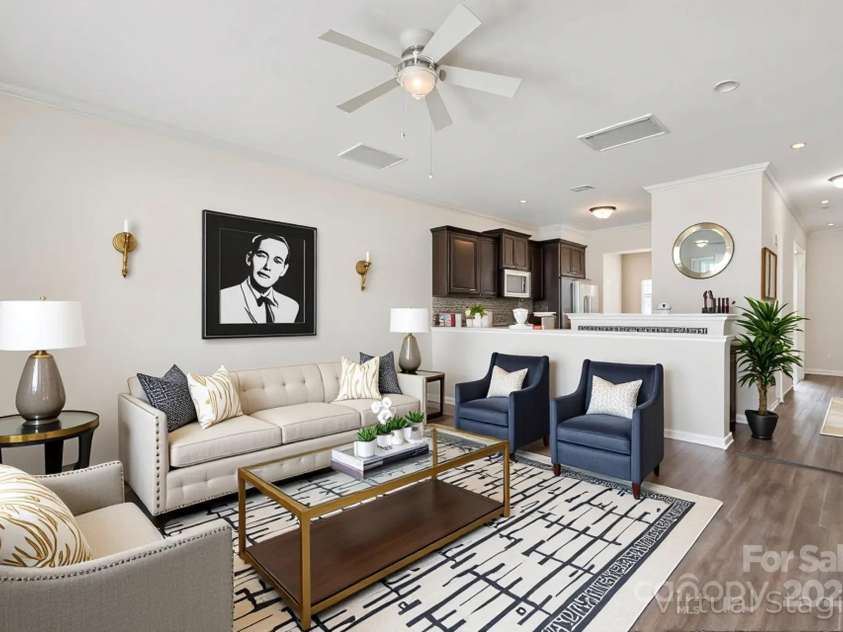 2822 Hopeton Court, Monroe, NC 28110.  MLS# CAR4285934, YatesRealty ID 35422. Large, open family room- virtually staged