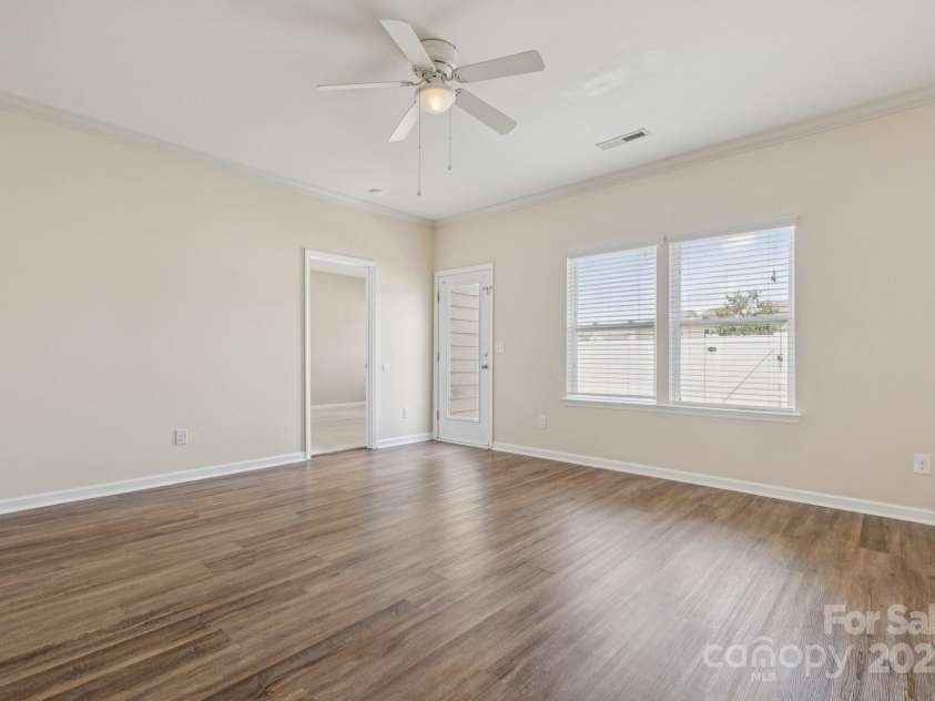 2822 Hopeton Court, Monroe, NC 28110.  MLS# CAR4285934, YatesRealty ID 35422. Living room to backyard