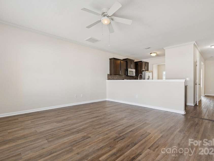 2822 Hopeton Court, Monroe, NC 28110.  MLS# CAR4285934, YatesRealty ID 35422. Living room with open floor plan