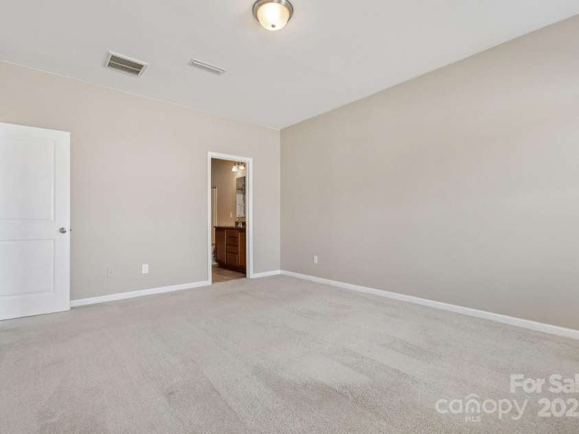 2822 Hopeton Court, Monroe, NC 28110.  MLS# CAR4285934, YatesRealty ID 35422. Primary bedroom on the main level