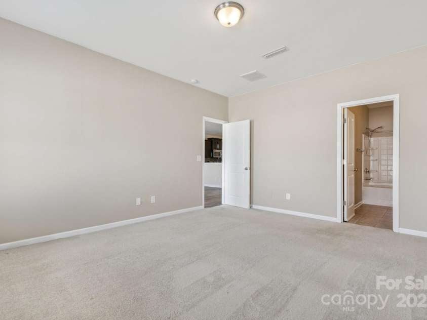 2822 Hopeton Court, Monroe, NC 28110.  MLS# CAR4285934, YatesRealty ID 35422. Primary bedroom on the main level