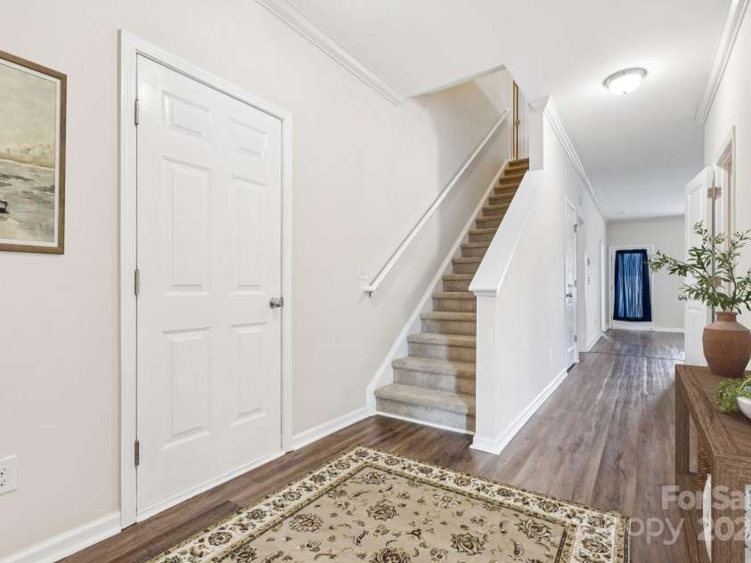 2822 Hopeton Court, Monroe, NC 28110.  MLS# CAR4285934, YatesRealty ID 35422. Virtually staged- entryway to 1 car garage