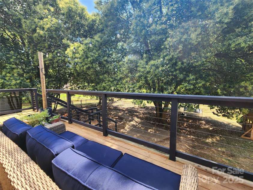 4022 Lynn Circle, Shelby, NC 28152.  MLS# CAR4284820, YatesRealty ID 35436. Steel cable rail system for unobstructed view