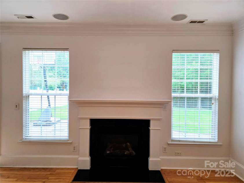 9930 Caldwell Depot Road, Cornelius, NC 28031.  MLS# CAR4290086, YatesRealty ID 35439. Living room with fireplace