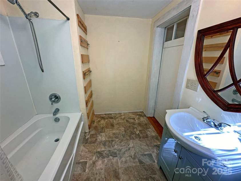 2131 Nc 10 Highway, Conover, NC 28613.  MLS# CAR4267448, YatesRealty ID 35440. Bath Room with Barn Door