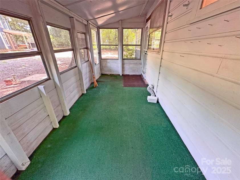 2131 Nc 10 Highway, Conover, NC 28613.  MLS# CAR4267448, YatesRealty ID 35440. Enclosed back porch