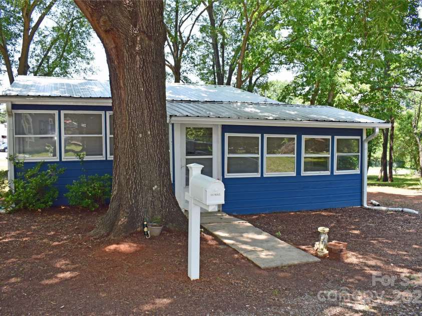 2131 Nc 10 Highway, Conover, NC 28613.  MLS# CAR4267448, YatesRealty ID 35440. Main house rear with enclosed back porch