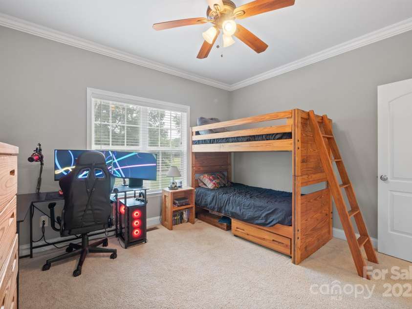 524 Lawyers Road, Indian Trail, NC 28079.  MLS# CAR4285960, YatesRealty ID 35442. Front Secondary Bedroom