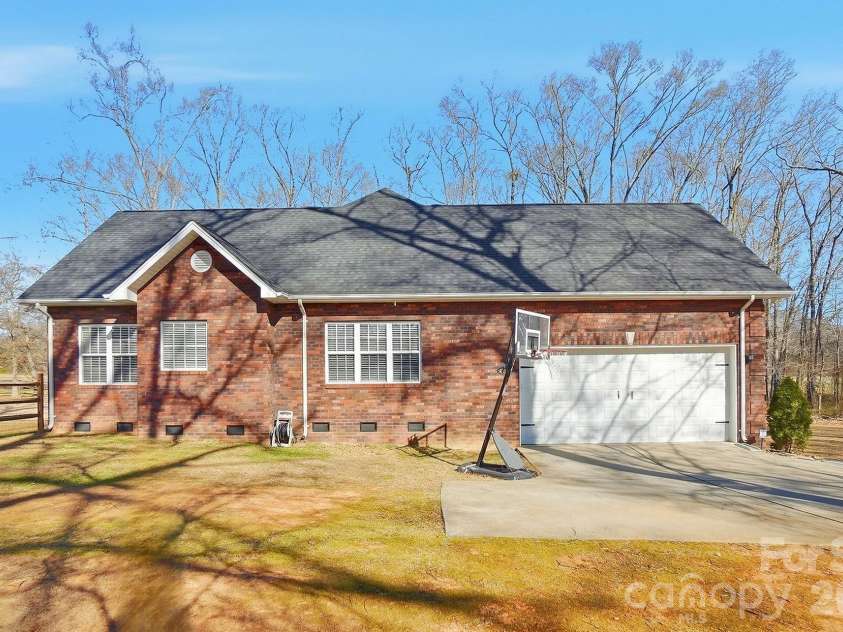524 Lawyers Road, Indian Trail, NC 28079.  MLS# CAR4326347, YatesRealty ID 35442. Huge 605sq ft Side-Load Garage