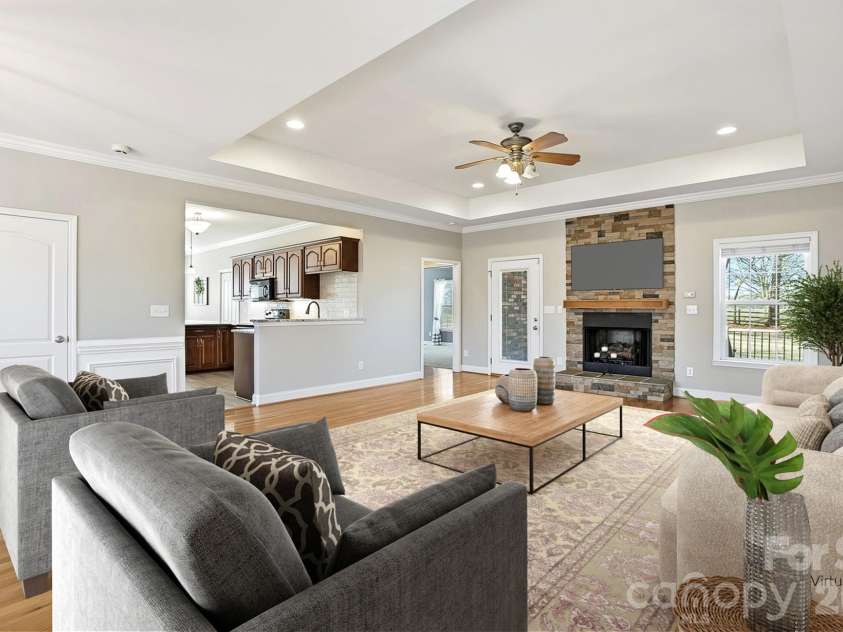 524 Lawyers Road, Indian Trail, NC 28079.  MLS# CAR4326347, YatesRealty ID 35442. Huge Living Room with Fireplace - virtually staged