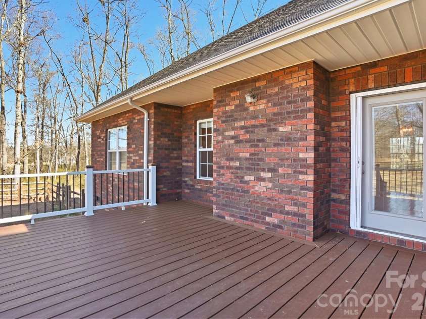 524 Lawyers Road, Indian Trail, NC 28079.  MLS# CAR4326347, YatesRealty ID 35442. Large Trex Deck