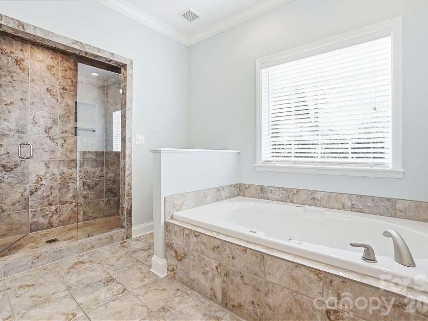 524 Lawyers Road, Indian Trail, NC 28079.  MLS# CAR4326347, YatesRealty ID 35442. Primary Bathroom Suite