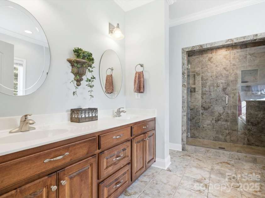 524 Lawyers Road, Indian Trail, NC 28079.  MLS# CAR4326347, YatesRealty ID 35442. Stunning Primary Bathroom