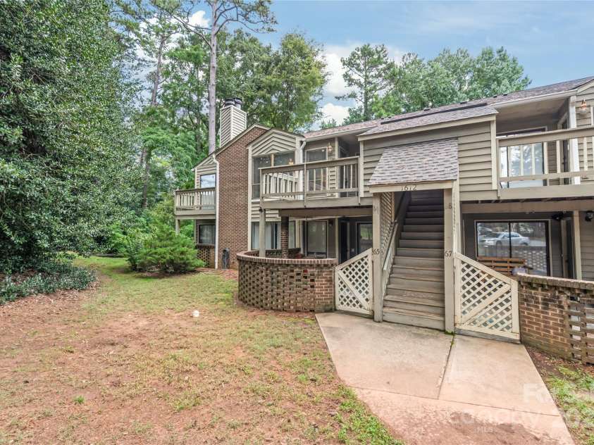 1612 Sharon Road, Charlotte, NC 28210.  MLS# CAR4292881, YatesRealty ID 35444. Stairs to unit 66