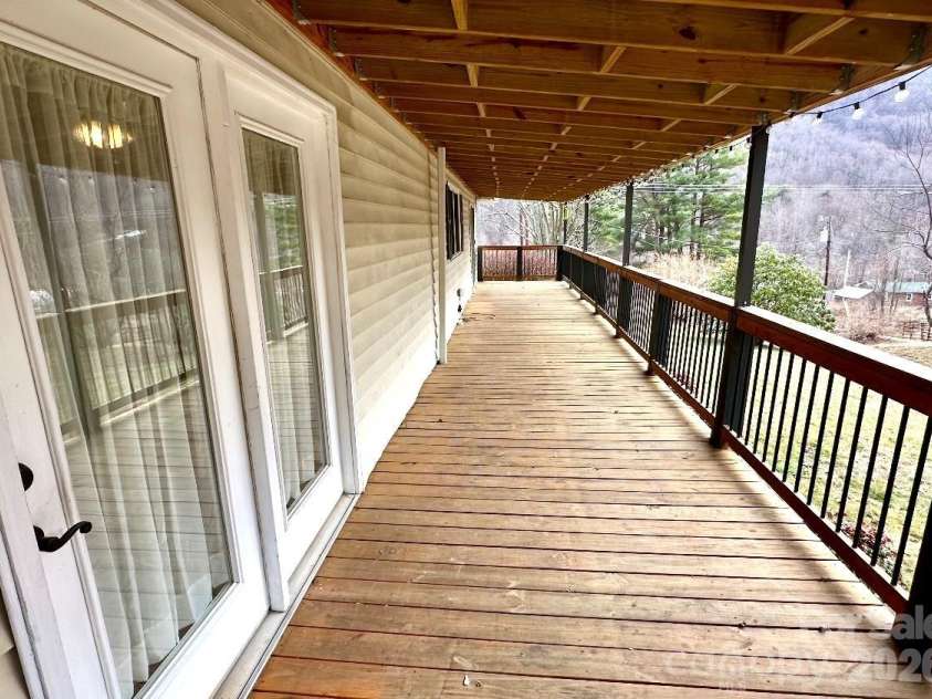 1567 Newfound Road, Leicester, NC 28748.  MLS# CAR4214973, YatesRealty ID 35448. Covered porch