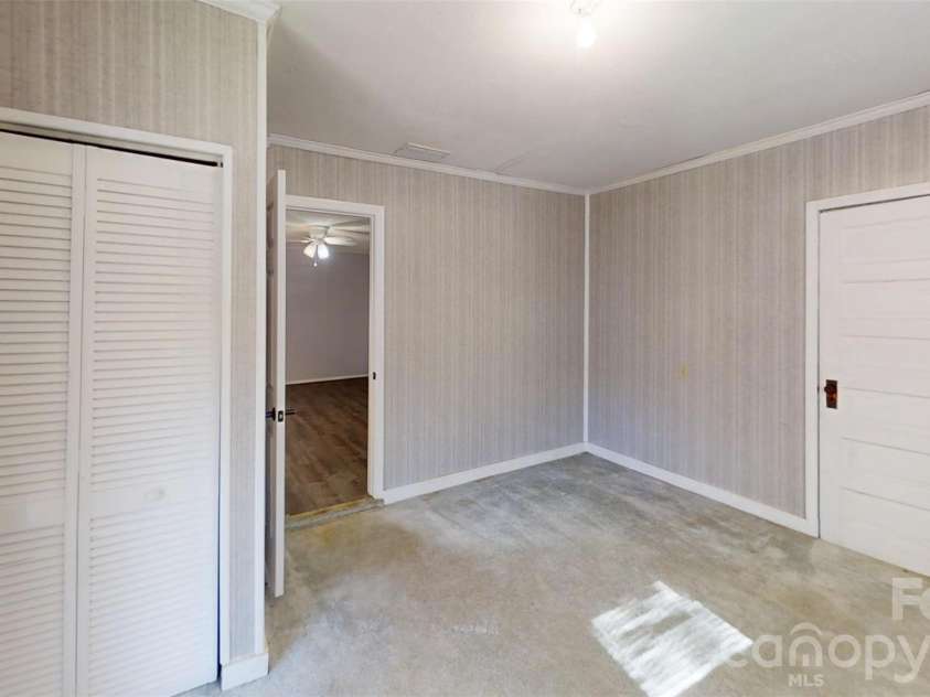 1567 Newfound Road, Leicester, NC 28748.  MLS# CAR4214973, YatesRealty ID 35448. Primary Bedroom