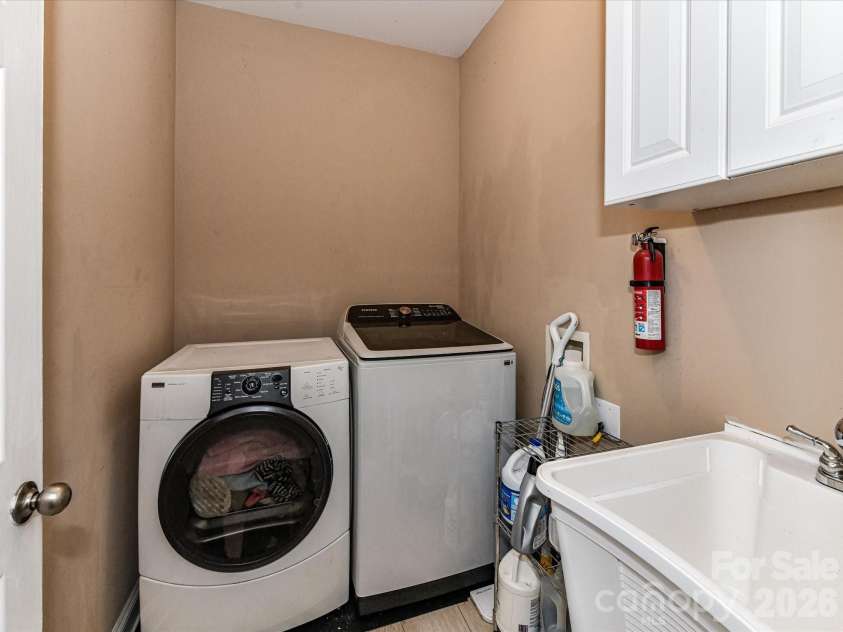 9608 Indian Beech Avenue, Concord, NC 28027.  MLS# CAR4296375, YatesRealty ID 35453. Laundry Downstairs