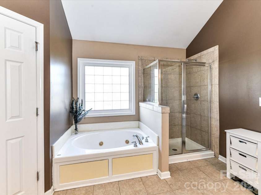 9608 Indian Beech Avenue, Concord, NC 28027.  MLS# CAR4296375, YatesRealty ID 35453. Primary Bathroom