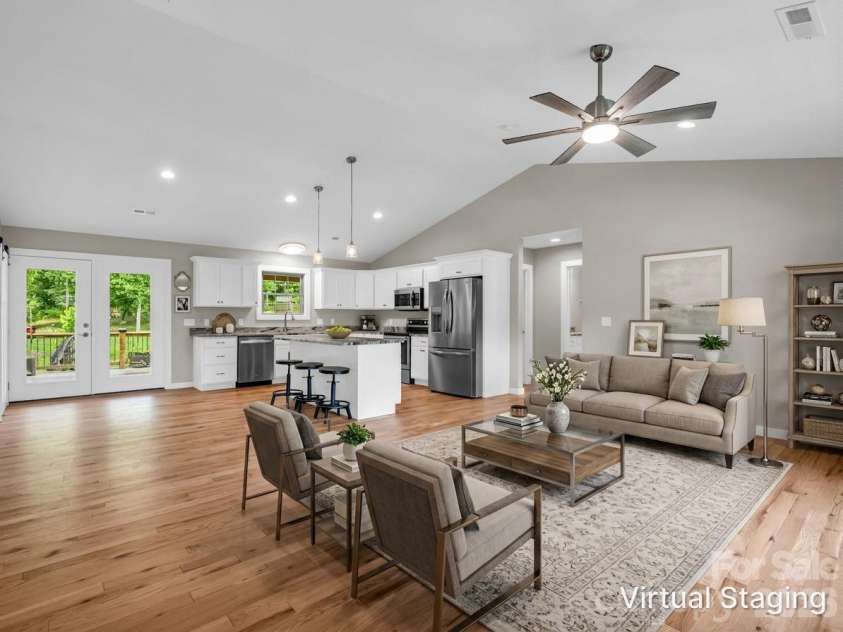 100 Walt Drive, Hendersonville, NC 28792.  MLS# CAR4391654, YatesRealty ID 35457. Great room virtually staged
