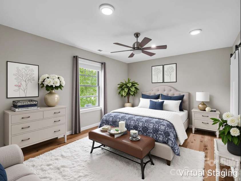 100 Walt Drive, Hendersonville, NC 28792.  MLS# CAR4391654, YatesRealty ID 35457. Primary bedroom virtually staged