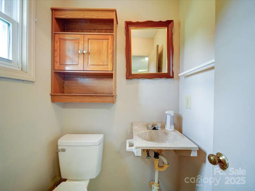 4115 Jenkins Road, Marshville, NC 28103.  MLS# CAR4325461, YatesRealty ID 3546. Barn Bathroom
