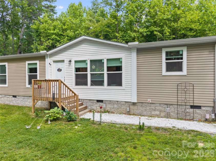 64 Tupper Lane, Hendersonville, NC 28792.  MLS# CAR4398491, YatesRealty ID 35462. 