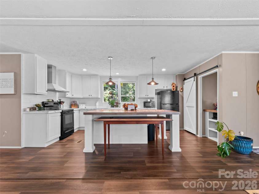 64 Tupper Lane, Hendersonville, NC 28792.  MLS# CAR4398491, YatesRealty ID 35462. 