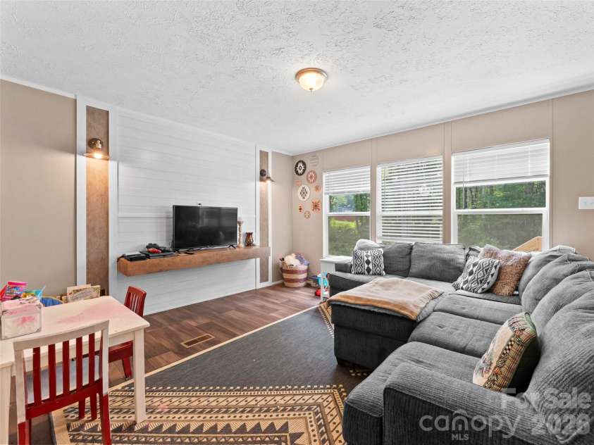64 Tupper Lane, Hendersonville, NC 28792.  MLS# CAR4398491, YatesRealty ID 35462. 