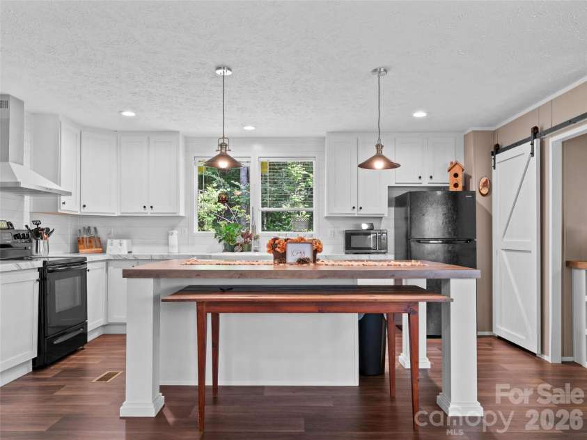64 Tupper Lane, Hendersonville, NC 28792.  MLS# CAR4398491, YatesRealty ID 35462. 