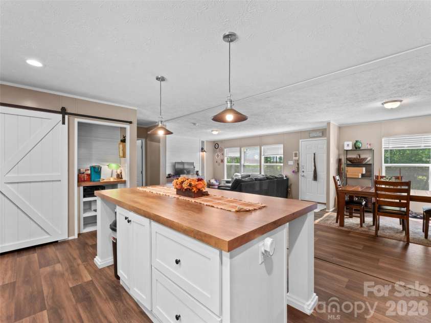 64 Tupper Lane, Hendersonville, NC 28792.  MLS# CAR4398491, YatesRealty ID 35462. 