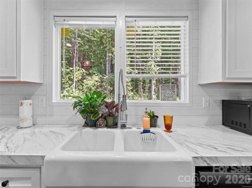 64 Tupper Lane, Hendersonville, NC 28792.  MLS# CAR4398491, YatesRealty ID 35462. 