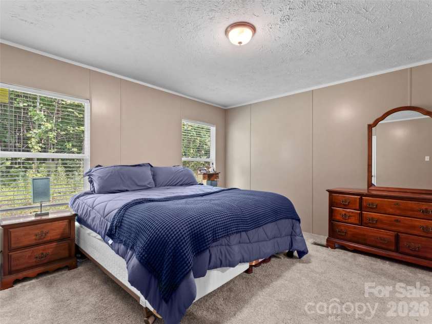 64 Tupper Lane, Hendersonville, NC 28792.  MLS# CAR4398491, YatesRealty ID 35462. 