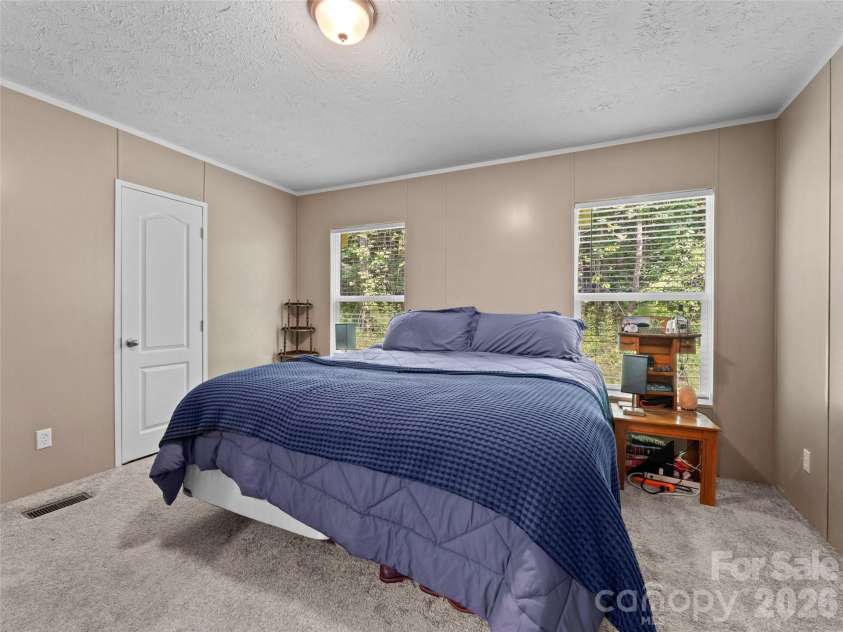 64 Tupper Lane, Hendersonville, NC 28792.  MLS# CAR4398491, YatesRealty ID 35462. 