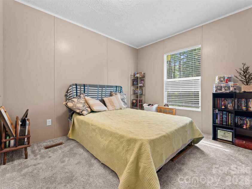64 Tupper Lane, Hendersonville, NC 28792.  MLS# CAR4398491, YatesRealty ID 35462. 