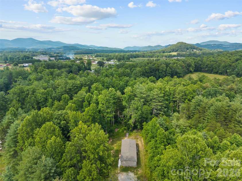 64 Tupper Lane, Hendersonville, NC 28792.  MLS# CAR4398491, YatesRealty ID 35462. 