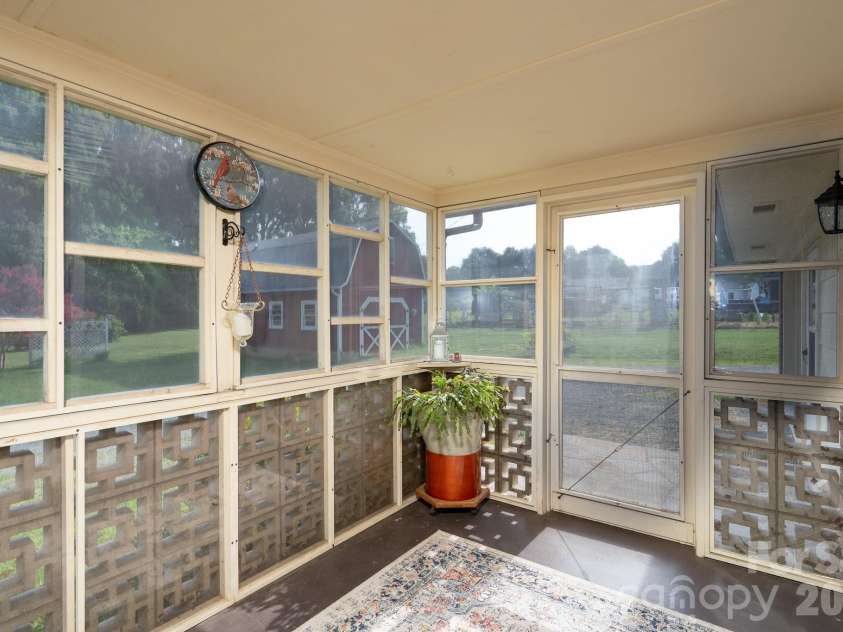 122 Lowder Road, Albemarle, NC 28001.  MLS# CAR4400819, YatesRealty ID 35467. Back porch off breakfast are