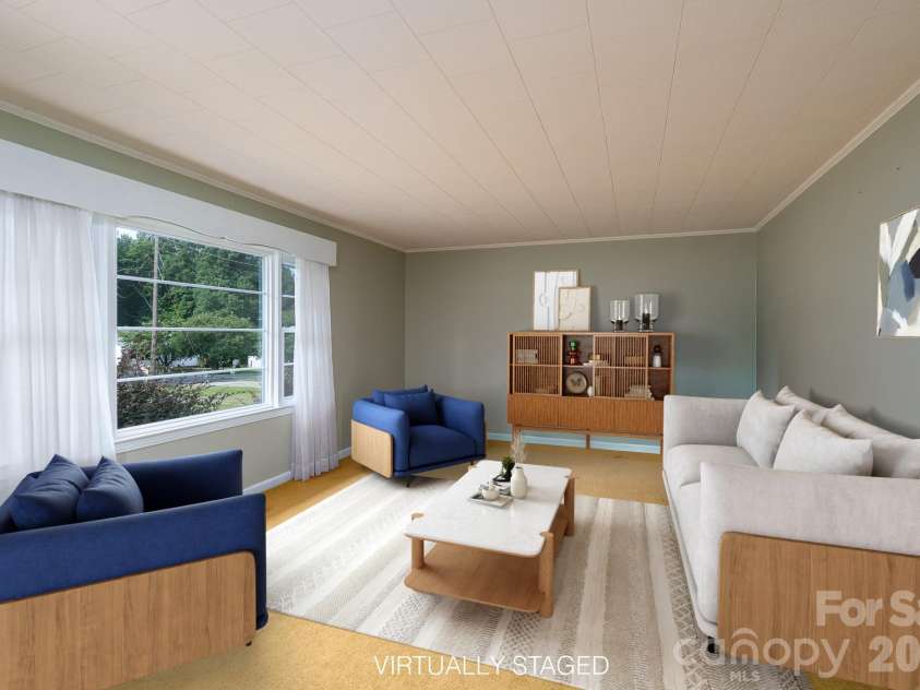 122 Lowder Road, Albemarle, NC 28001.  MLS# CAR4400819, YatesRealty ID 35467. Living room virtually staged