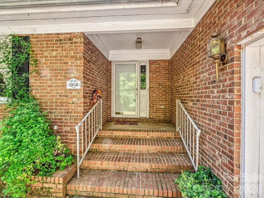 5950 King Wilkinson Road, Denver, NC 28037.  MLS# CAR4398523, YatesRealty ID 35480. Covered front entry