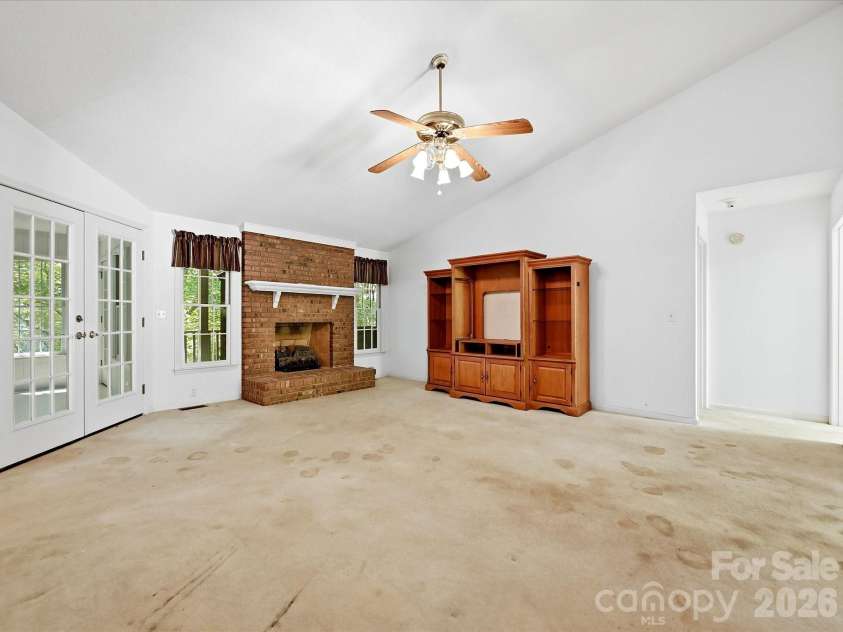 5950 King Wilkinson Road, Denver, NC 28037.  MLS# CAR4398523, YatesRealty ID 35480. Great room with fireplace