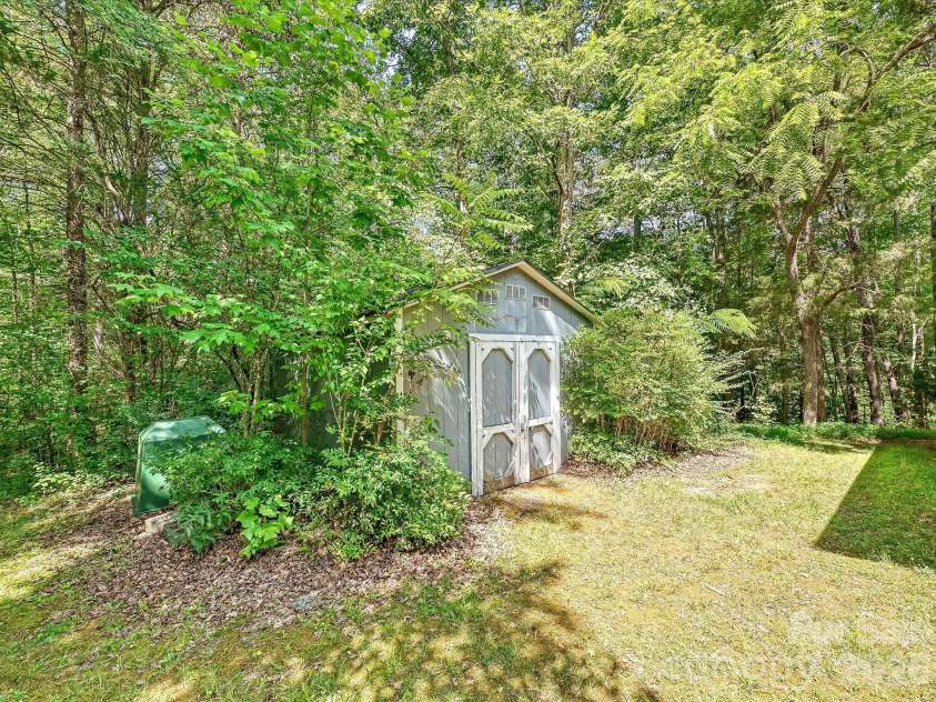 5950 King Wilkinson Road, Denver, NC 28037.  MLS# CAR4398523, YatesRealty ID 35480. Storage shed